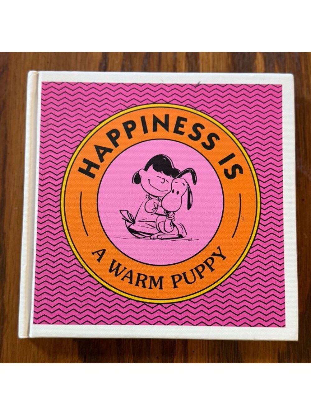 Happiness Is a Warm Puppy (Peanuts) - Hardcover By Schulz, Charles M. - GOOD